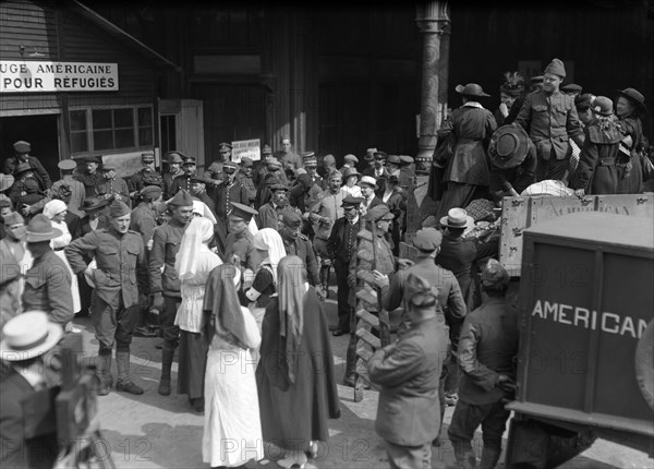 truck load of French refugees outside the American Red Cross canteen at the Gare du Nord