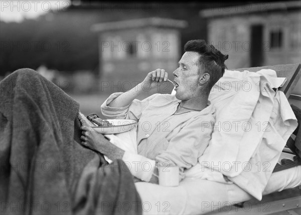 Injured American Soldier eating at American Red Cross Hospital No. 5.