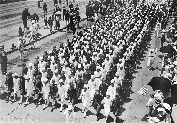 Junior Red Cross Auxiliary forming American Flag