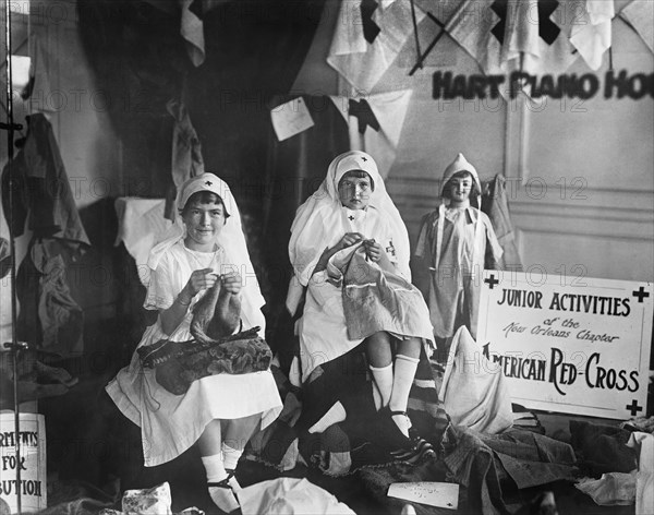 two Young Girls Knitting as part of Junior Activities of the New Orleans Chapter of American Red Cross