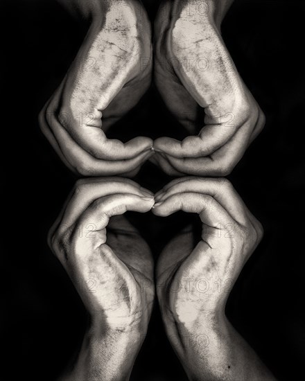 Two sets of Heart Hands against Black Background