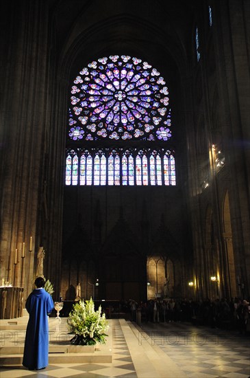 Rear View of Priest in Notre Dame Cathedral