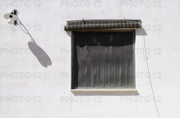 Square Window and White Wall