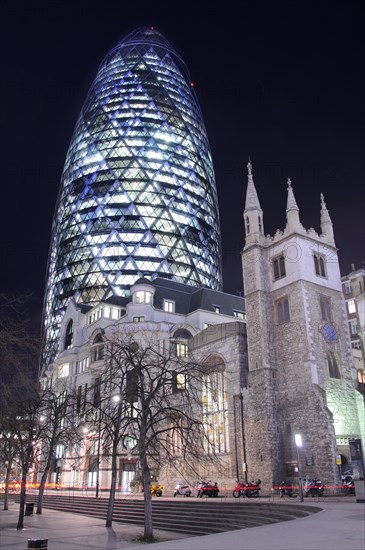 Gherkin Tower and St. Andrew Church at Night
