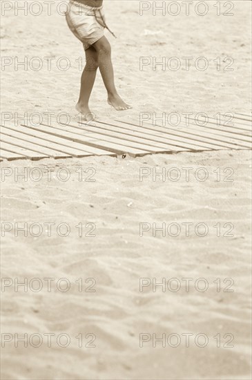 Waist-Down View of Beach Boy