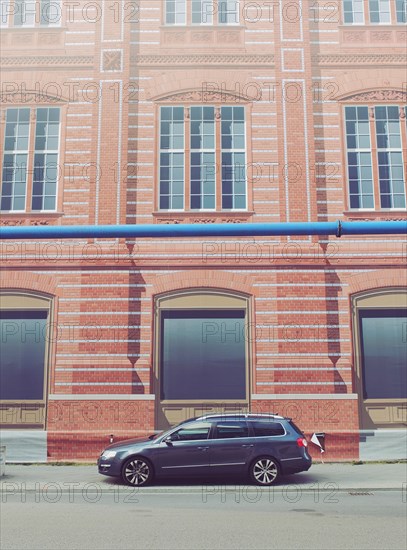 Parked Car with Fake Buildings Scene hiding Construction Site