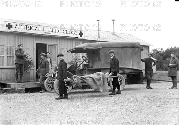 American Soldier with bad leg Wound arriving at American Red Cross Hospital close behind front line