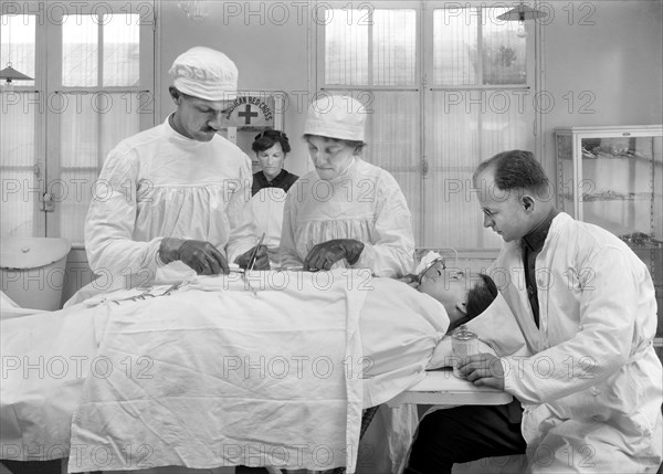 Convalescent American Soldiers lined in front of American Red Cross Bath House waiting their turn