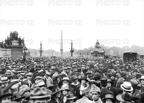 Crowd gathered to see American Troops march in Parade to Celebrate American Independence Day