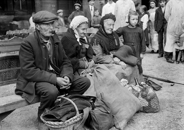 Group of Refugees from Mourmelon-Petit in yard at St. Sulpice