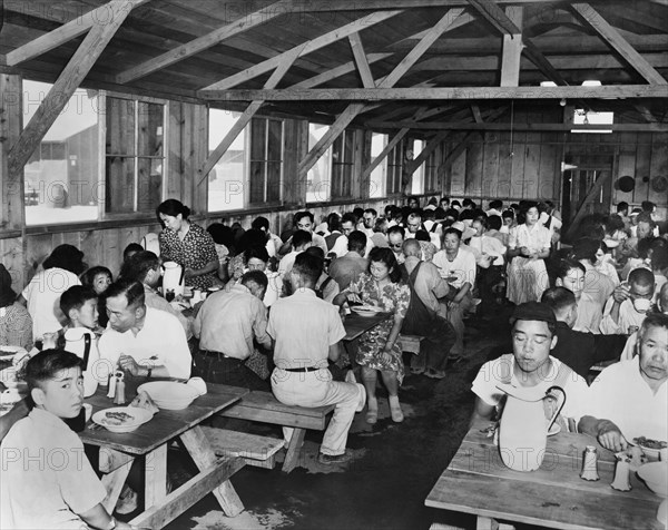 Evacuees of Japanese Ancestry eating in Dining Hall