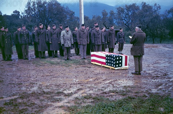 Chaplain R.T. DuBrau conducting Rainy GI Funeral