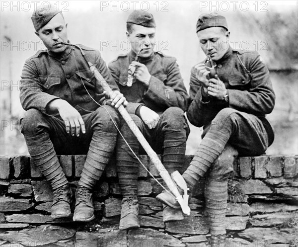 Three American Soldiers smoking Pipes at end of World War I