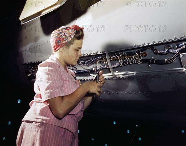 Woman working at Electrical Assembly and Installation