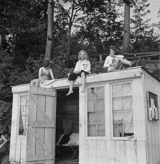 Three Girls sunning themselves after a Swim