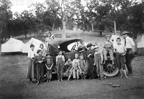 Group Portrait of Children around Car at Kiddie Camp funded and maintained by American Red Cross
