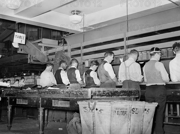 Workers sorting mail at Main Post Office, Washington, 1938