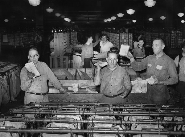 Workers sorting mail at Main Post Office, Washington, 1938