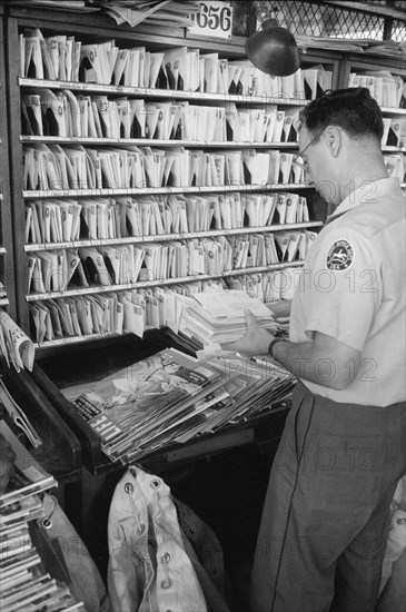 Workers sorting mail at Post Office, New York City, May 1957