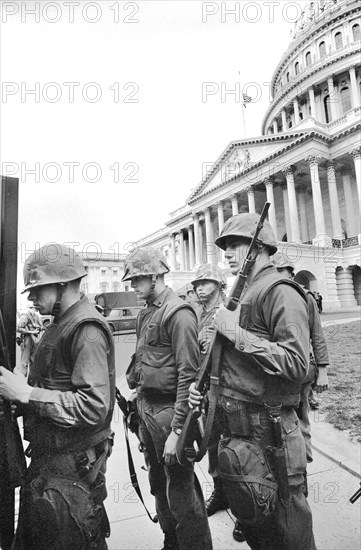 U.S. Soldiers stand guard near U.S. Capitol, during Riots following Dr. Martin Luther King Jr's, 1968