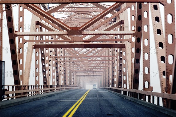 Two-Lane Bridge, Vehicle pulling Horse Trailer in Distance,