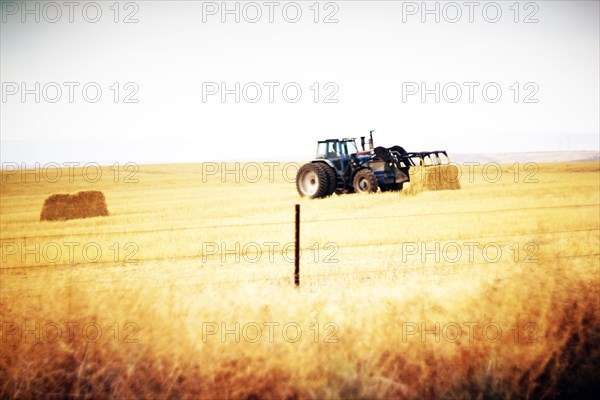 Tractor and Hay Bales in Field,,