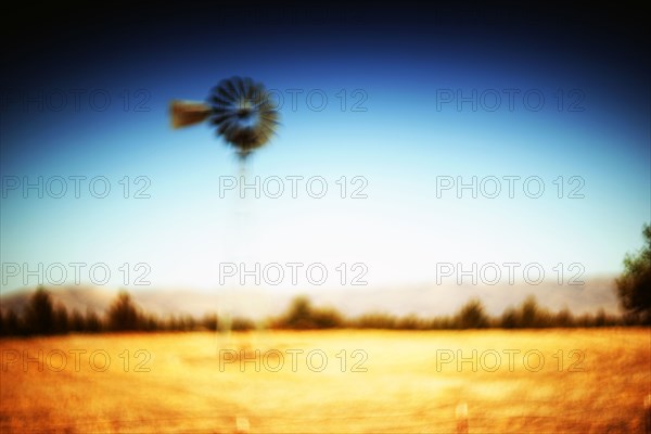 Old Windmill in Rural Landscape, Soft Focus,