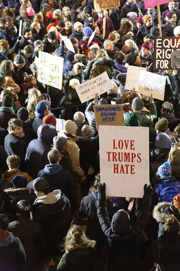 High Angle View of Crowd holding Signs at Protest against Muslim Travel Ban, JFK Airport,