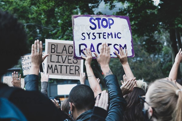 Protesters Holding up Signs at Black Lives Matter March, McCarron Park,