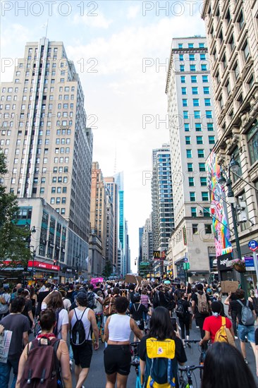 Crowd of Protesters with Signs during Juneteenth March, 6th Avenue, New York City