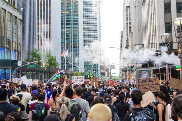 Crowd of Protesters with Signs during Juneteenth March, 6th Avenue, New York City