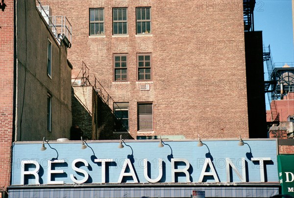 Blue & White Restaurant Sign on Building,,