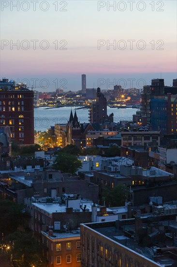 Cityscape at Dusk, Hudson River in Background,