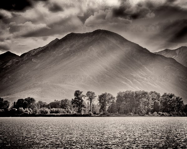 Mountain and Lake with Dramatic Sky and Shadows,,