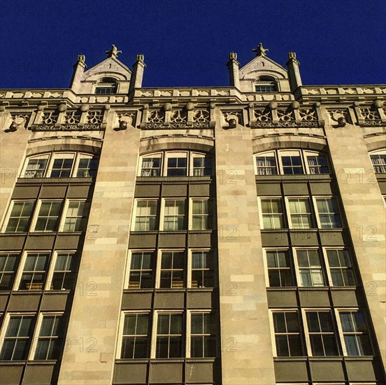 Low Angle View of Exterior of Stone Apartment Building,,