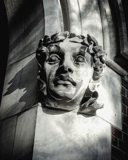 Human Figure Architectural Detail on Building, Close-up,