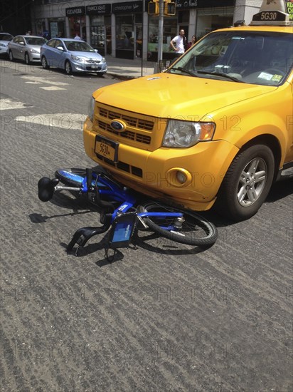 Taxi hitting Bicycle, Street Scene,