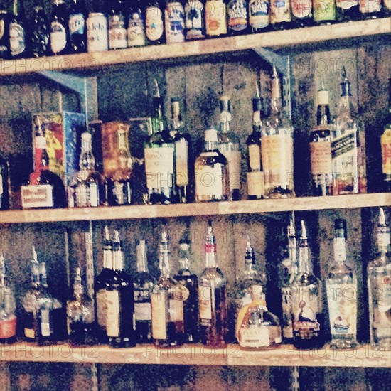 Liquor Bottles on Shelves,,