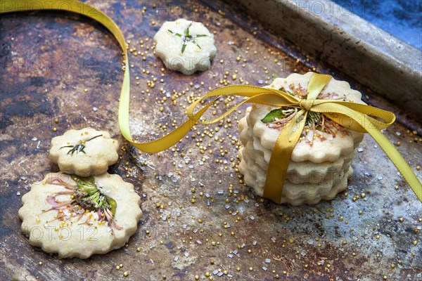 Small Stack of Shortbread Cookies with Bow Tie, Edible Flowers and Gold Sugar,