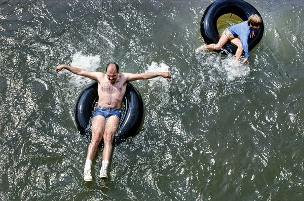 Two People floating in Inner Tube, High Angle View