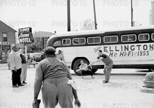 Duke Ellington and Band Members playing Baseball in front of their Segregated Motel while touring, Florida