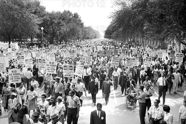 Crowd with Signs at March on Washington for Jobs and Freedom, Washington Monument in Background