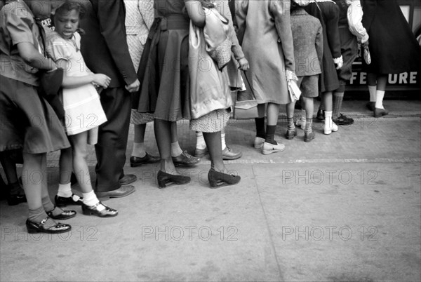 Children in front of Moving Picture Theater, Easter Sunday Matinee