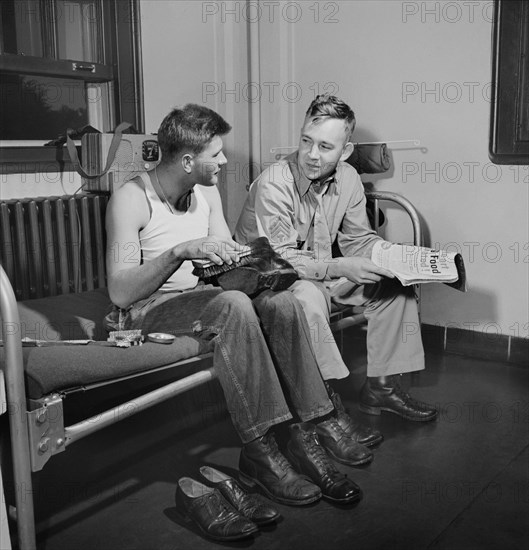 Sergeant George Camblair shining his Shoes, Fort Belvoir