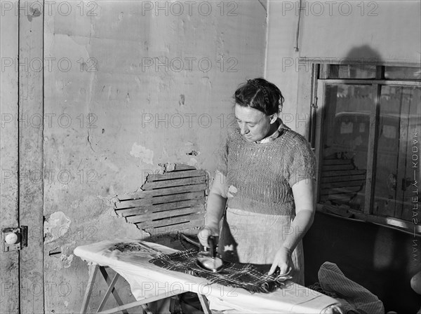 Mother of Farm family from North Carolina who have come to work in Defense Industries, Norfolk