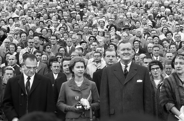 Queen Elizabeth II with Maryland Governor Theodore McKeldin (right) and University of Maryland president Wilson Homer "Bull" Elkins (left), at Maryland Terrapins vs. the North Carolina Tar Heels Football Game