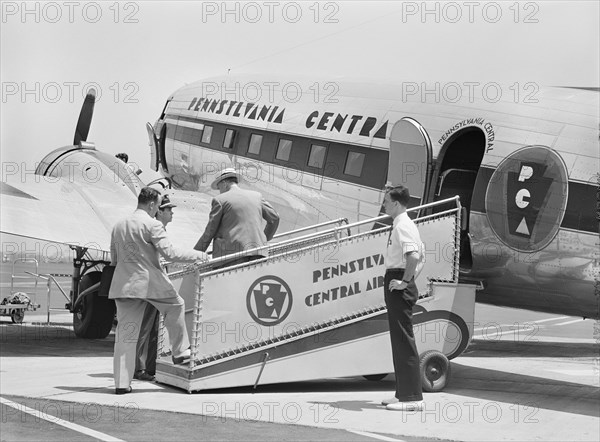 Passengers boarding Airplane, Municipal Airport