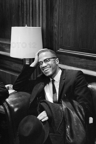 Malcolm X waiting at Martin Luther King Press Conference, Head and Shoulders Portrait