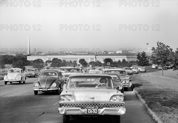 Rush Hour Traffic with Washington Memorial, Pentagon and Capitol Building in Background