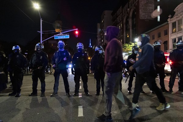 Heavily Geared NYPD Officers with Pedestrians at Night, Greenwich Village